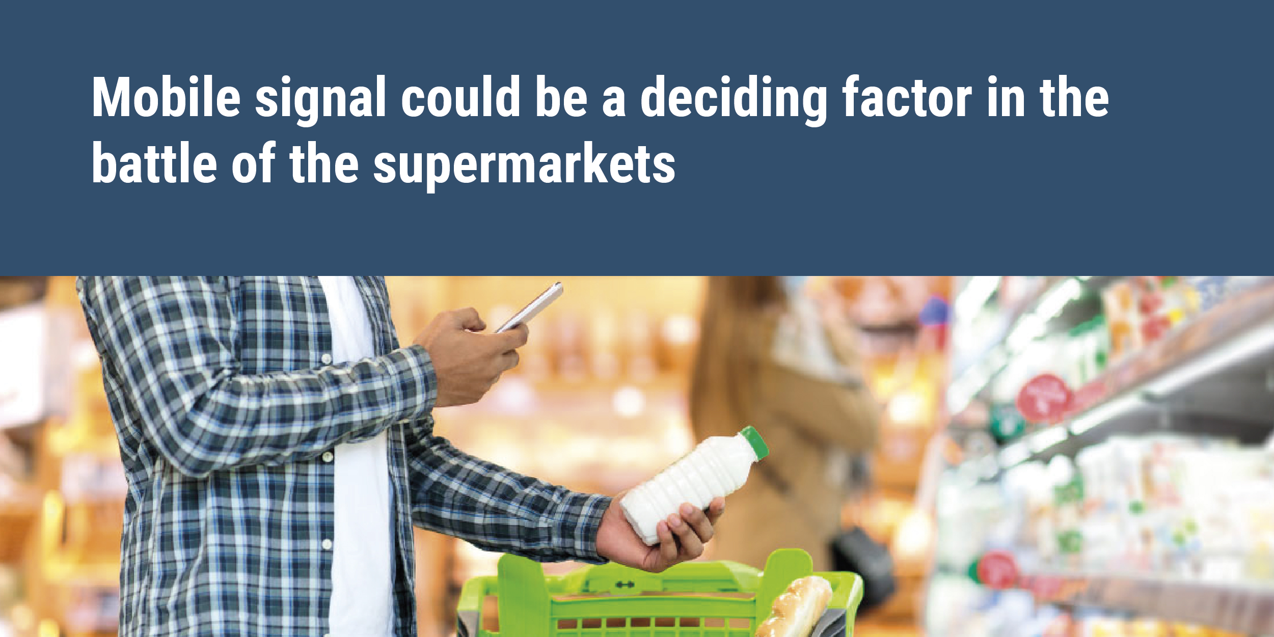 Mobile signal could be a deciding factor in the battle of the supermarkets - man on cellular phone in supermarket