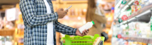 Man scanning an item at a supermarket