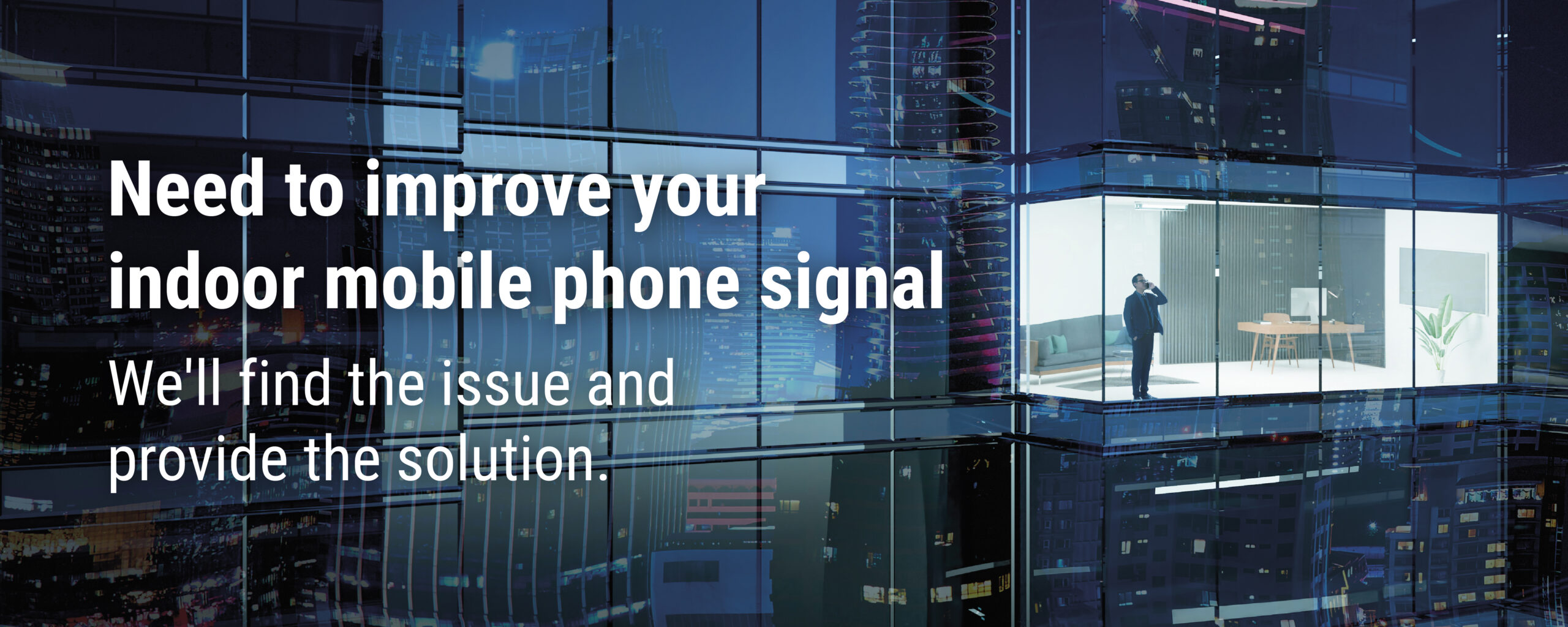 Need to improve your indoor mobile phone signal - man in high rise office building on mobile phone